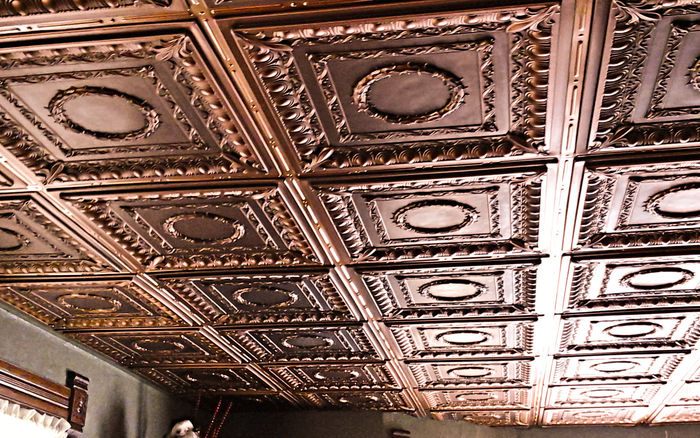Regal Antique Ceiling Tile in a Ceiling Grid